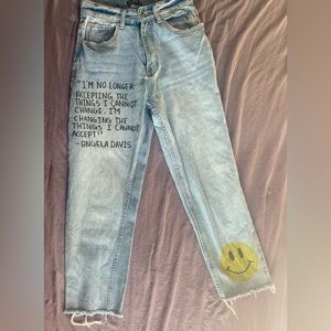 Customized fashionova jeans with Angela Davis quote.